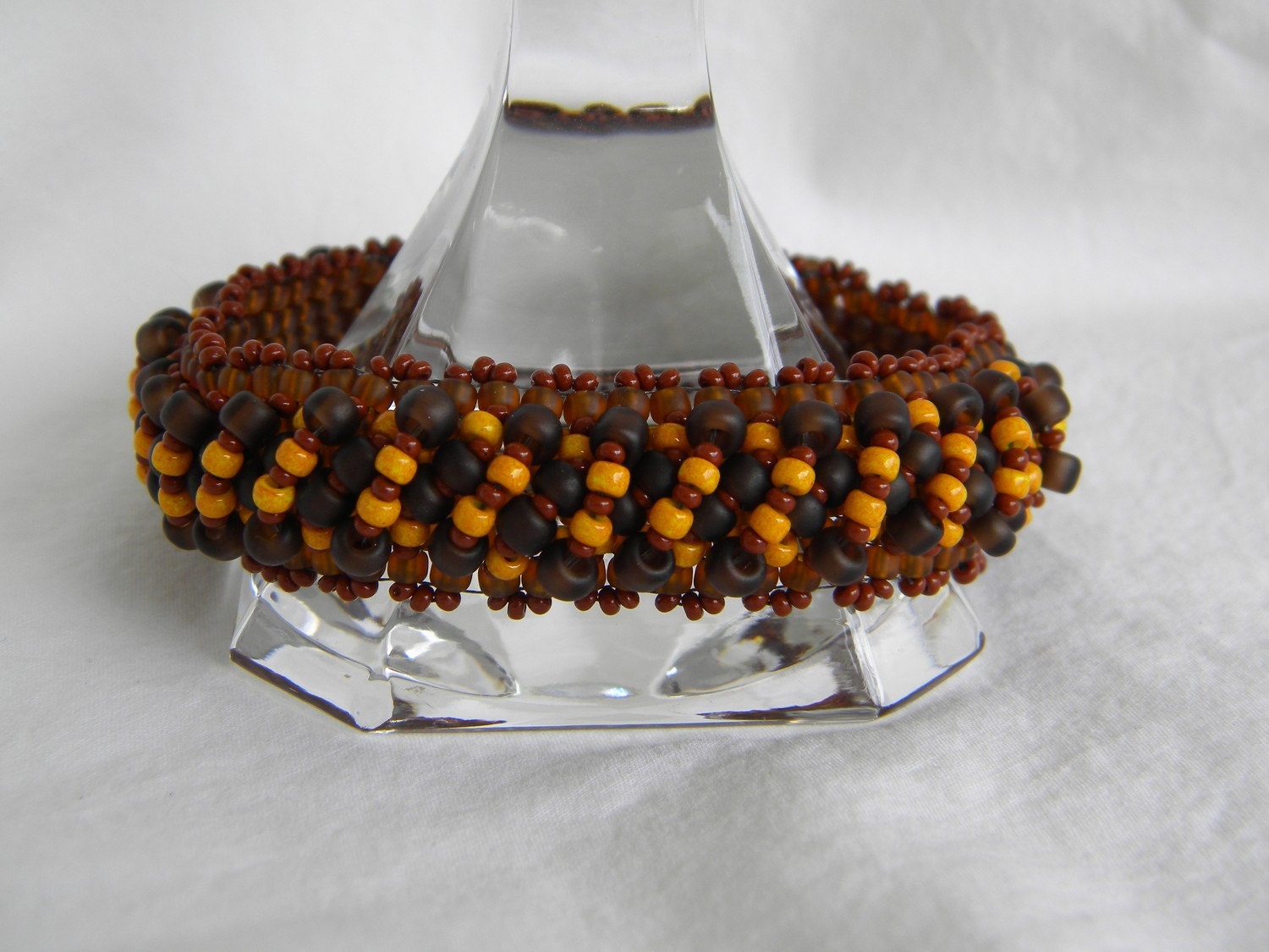 Tribal ... beadwoven bracelet beaded peyote bangle earthy autumn harvest rustic apricot tangerine rootbeer brown round circle hoop