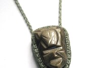 Macrame green necklace with carved obsidian mask - sold, made to order