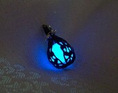 Mermaid's Magic - "Midnight Blue" Bronzed Caged Pendant with Glowing Essence of the Sea - Glow in the Dark