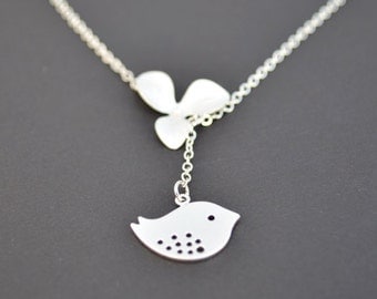 Sweet orchid and cute bird lariat necklace.