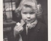 Vintage/ Antique photo of a little girl with a cute curly hair