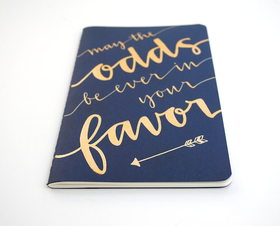RESERVED Hunger Games Inspired Notebook . Large Navy Moleskine with Gold Ink Calligraphy . May the Odds Be Ever in Your Favor