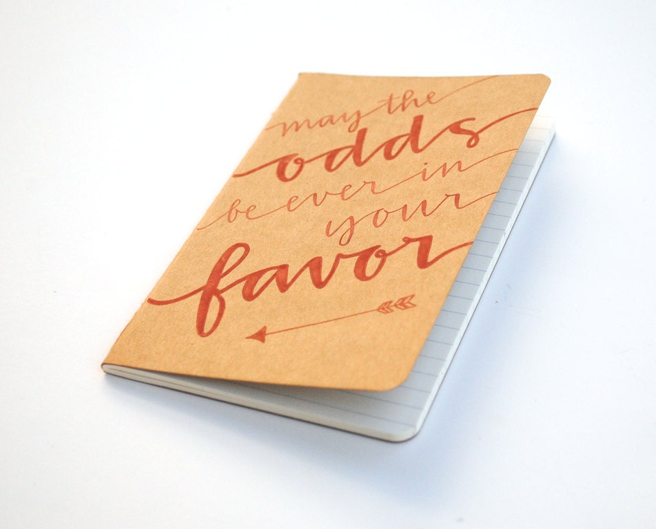 Hunger Games Notebook . Pocket Moleskine Cahier . Red Ink Calligraphy on Brown Kraft . Ruled . May the Odds Be Ever in Your Favor