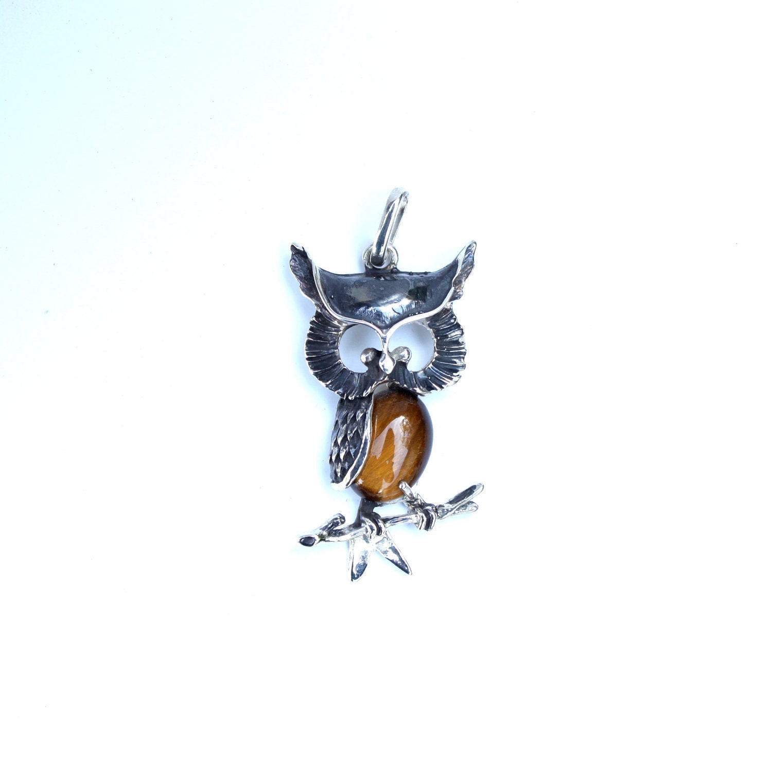 The Wise One, a sterling silver owl pendant.
