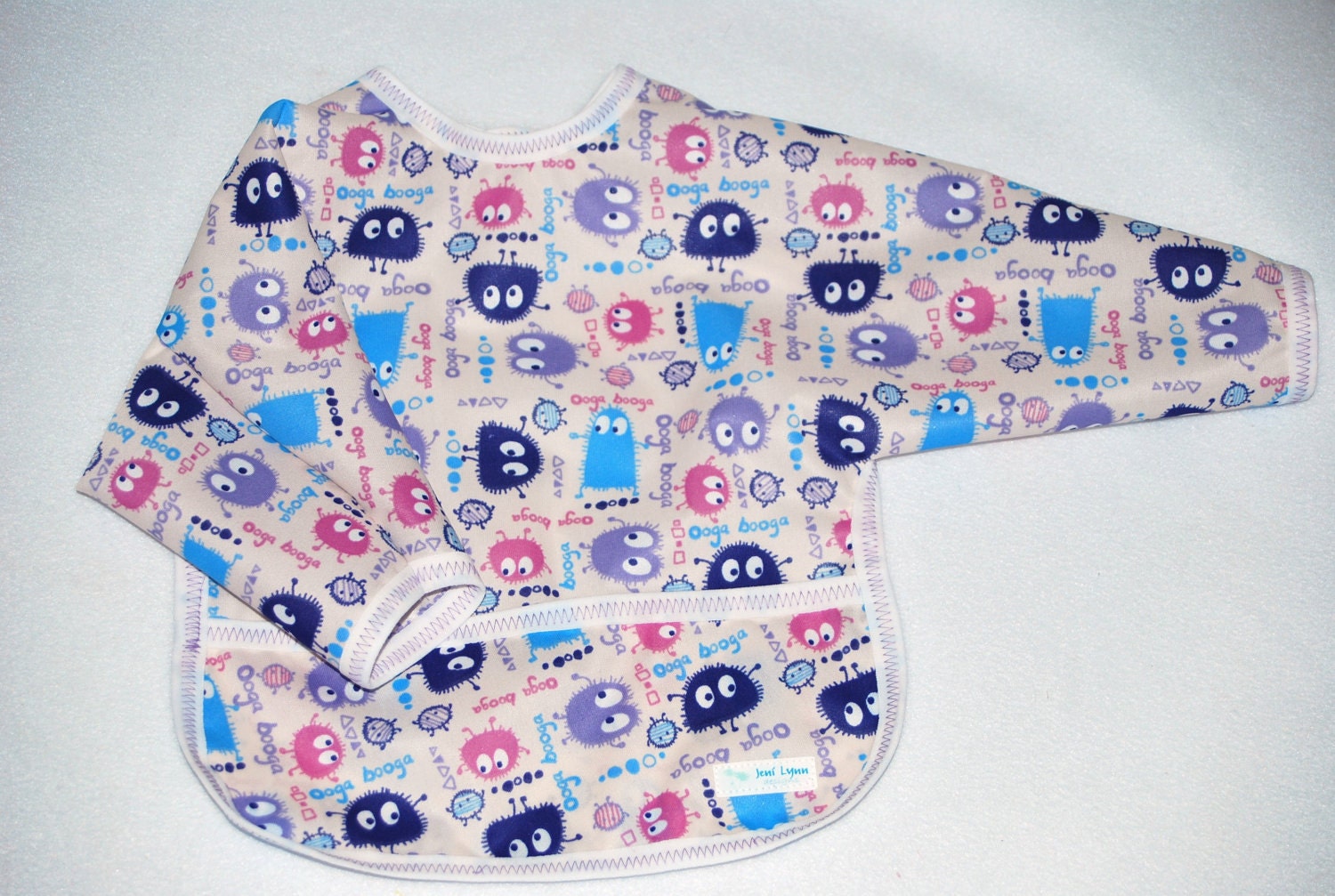 Shirt Saver Full Coverage Baby Bib With Long Sleeves and Pocket - Purple Ooga Booga Critters
