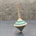 Square shaped spinning top (with blue stripes)