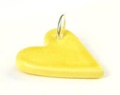 Sunny yellow heart ceramic pendant with silver plated jump loop - handmade