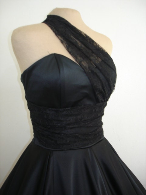 Made to measure 50s style cocktail dress made from high quality black satin and lace.