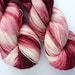Hand Dyed 75/25 BFL/Nylon Fingering Weight Yarn in Strawberries and Cream Colorway