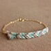 woven chevron gold bracelet - teal / grey