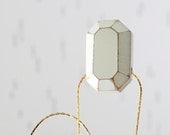 wood Diamond necklace. geometric jewelry. white faceted pendant. gold plated snake chain. modern minimalist