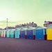 25% Off SALE Travel photograph fine art travel photo print. colorful yellow blue cyan green beach huts nautical Brighton UK