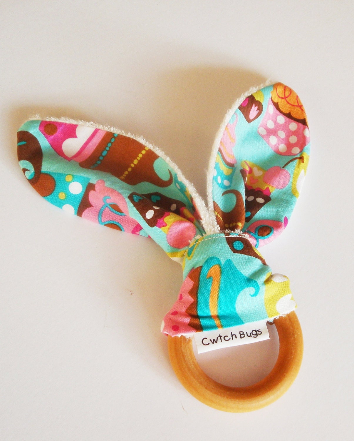Natural Wooden Teething Ring Soother in SWEET TREATS fabric and Bamboo Terry....another baby gift idea from Cwtch Bugs