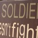 A Soldier. customized sign 11x24 support our troops.