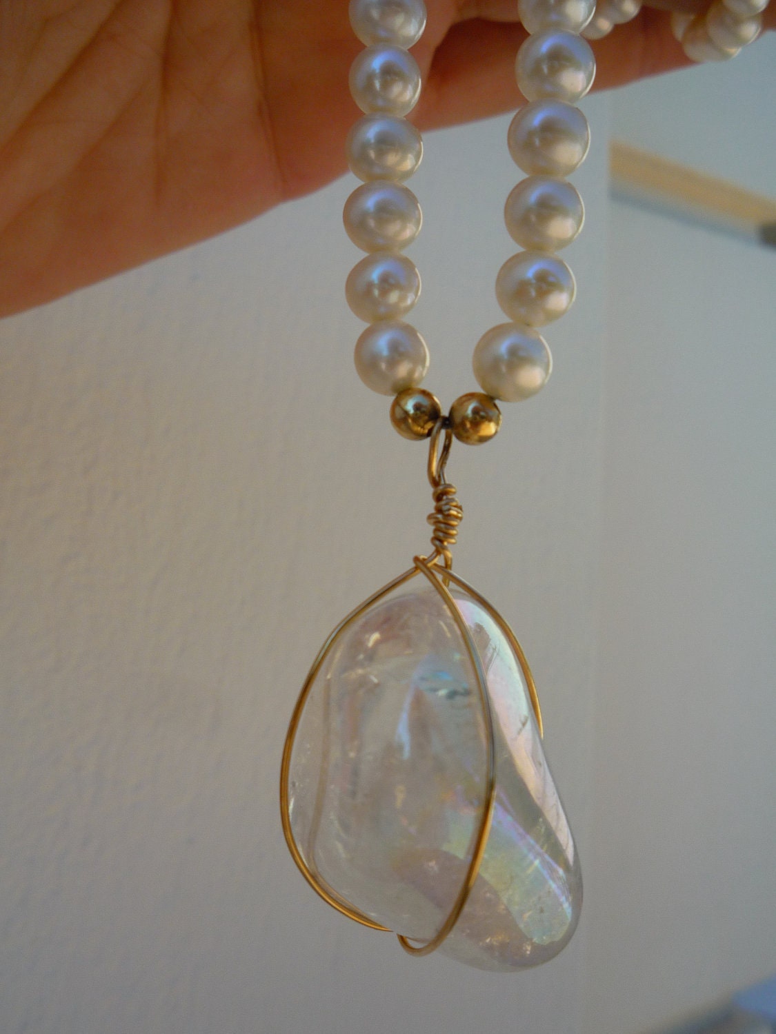 White Freshwater Pearls Necklace  with  Angel Aura Crystal Quartz pendant.