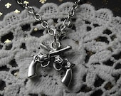 Double shot pistol charm Necklace : Silver tone