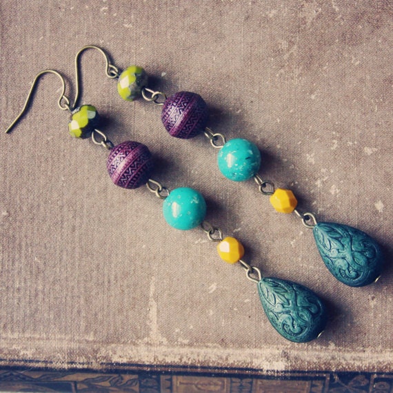 jada.  a pair of jewel toned beaded earrings.