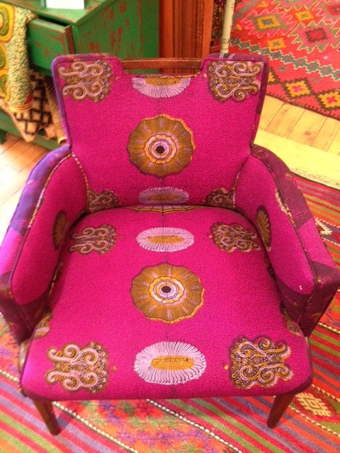 Mid century club chairs reupholstered in purple african wax print fabrics