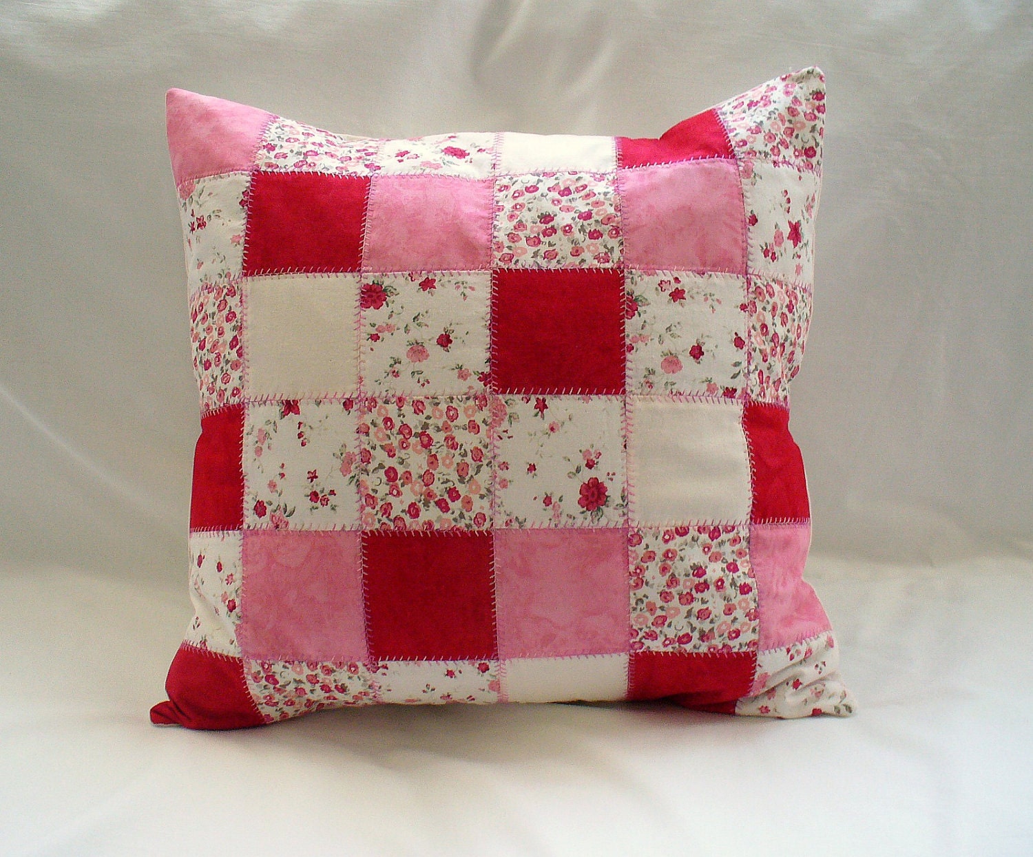 patchwork pillow- cream, pink and dark red