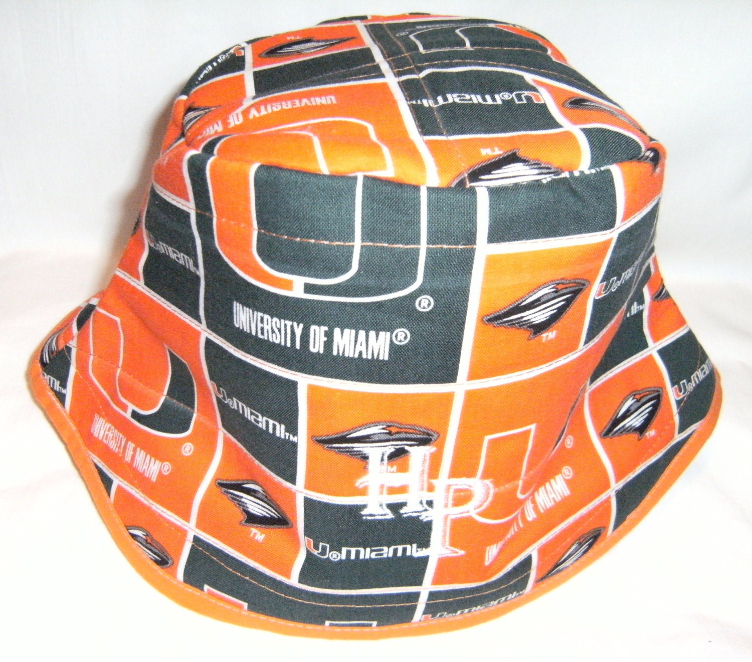 Miami Hurricanes orange-base bucket hat by Hamlet Pericles