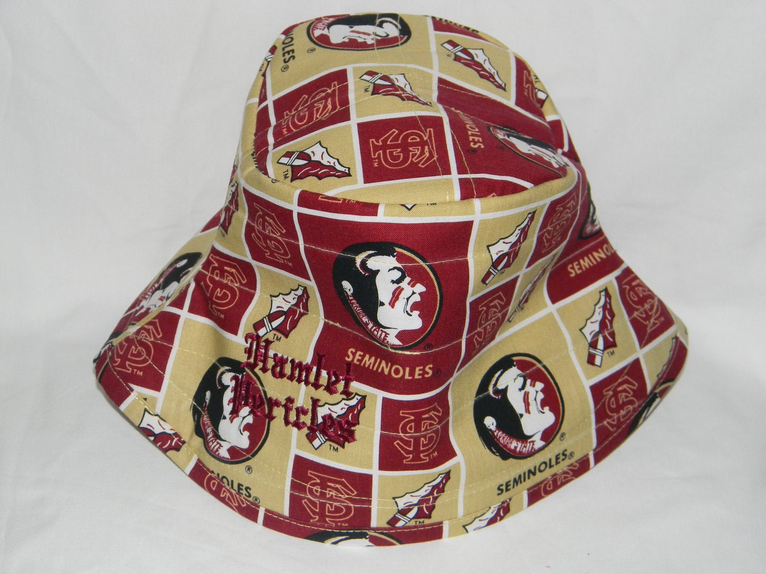 FSU gold-burgundy squares bucket hat by Hamlet Pericles
