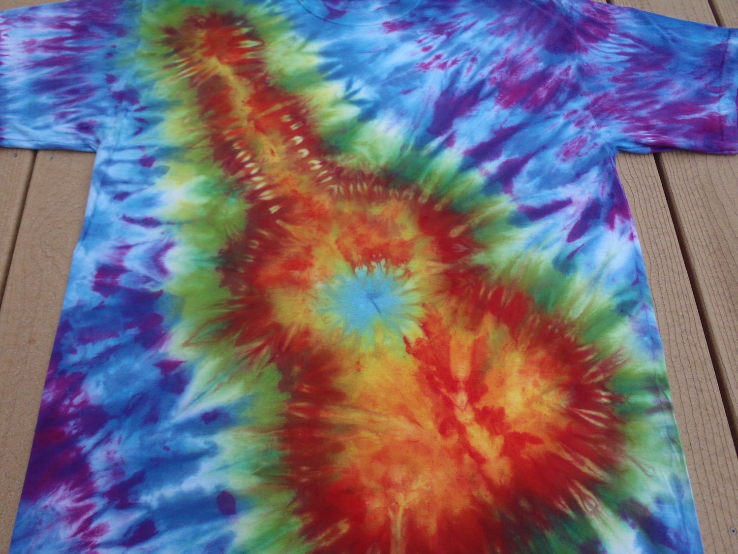 Guitar Tie Dye, blues, yellows, red violet, orange, green, MAN'S XL, design on the front and back.