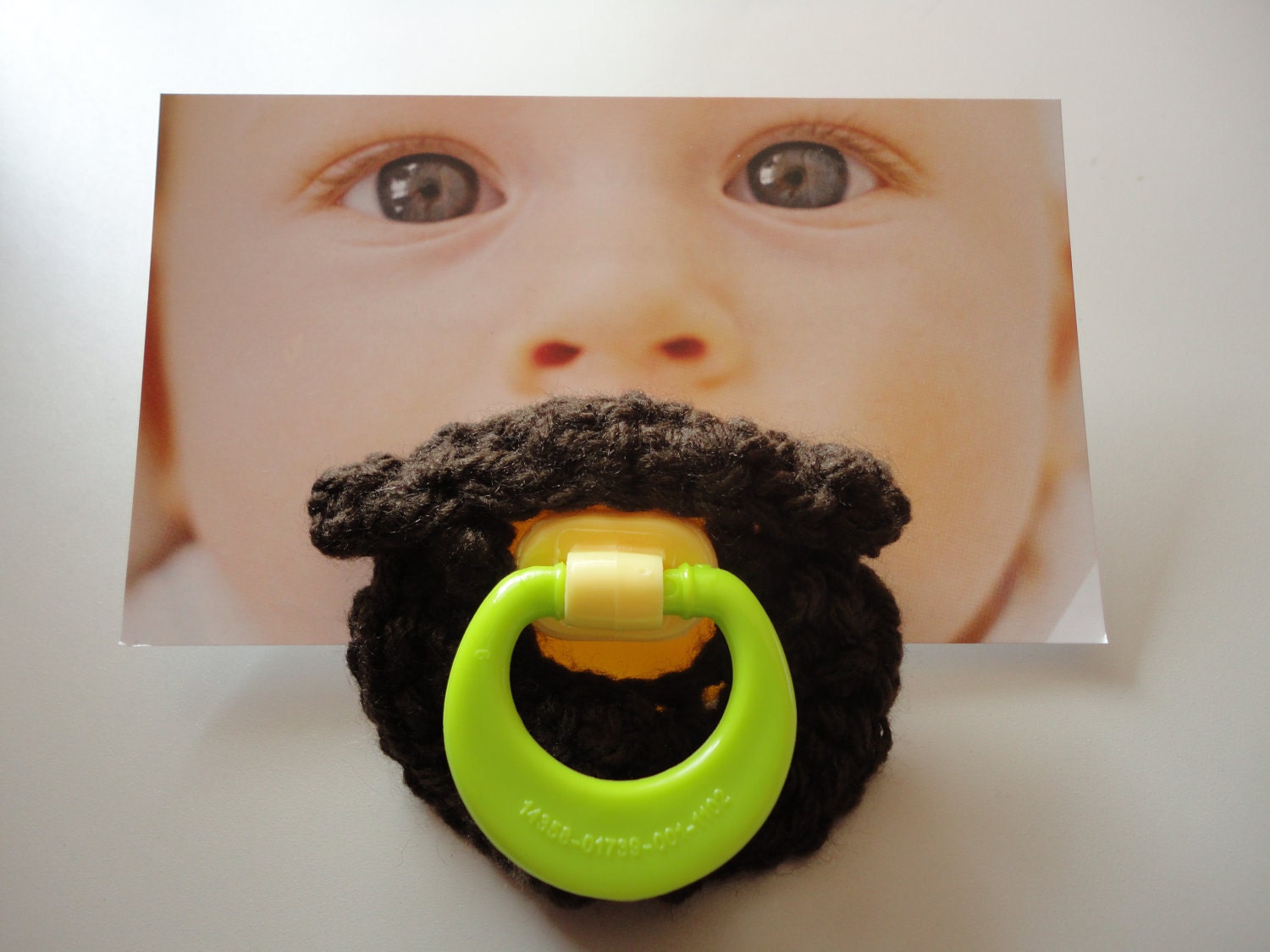 Crocheted mustache pacifier - The Folk Singer