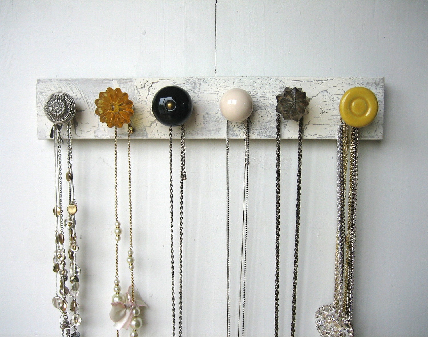 Hanging Jewelry Organizer with Yellow and Gray Knobs