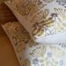 Yellow and gray floral medallion decorative pillow cover