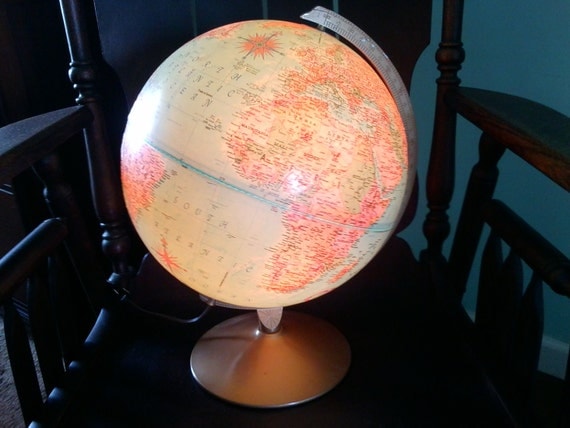 Vintage lighted Replogle globe-vintage "world premier" globe with stunning lighted feature and silver accents