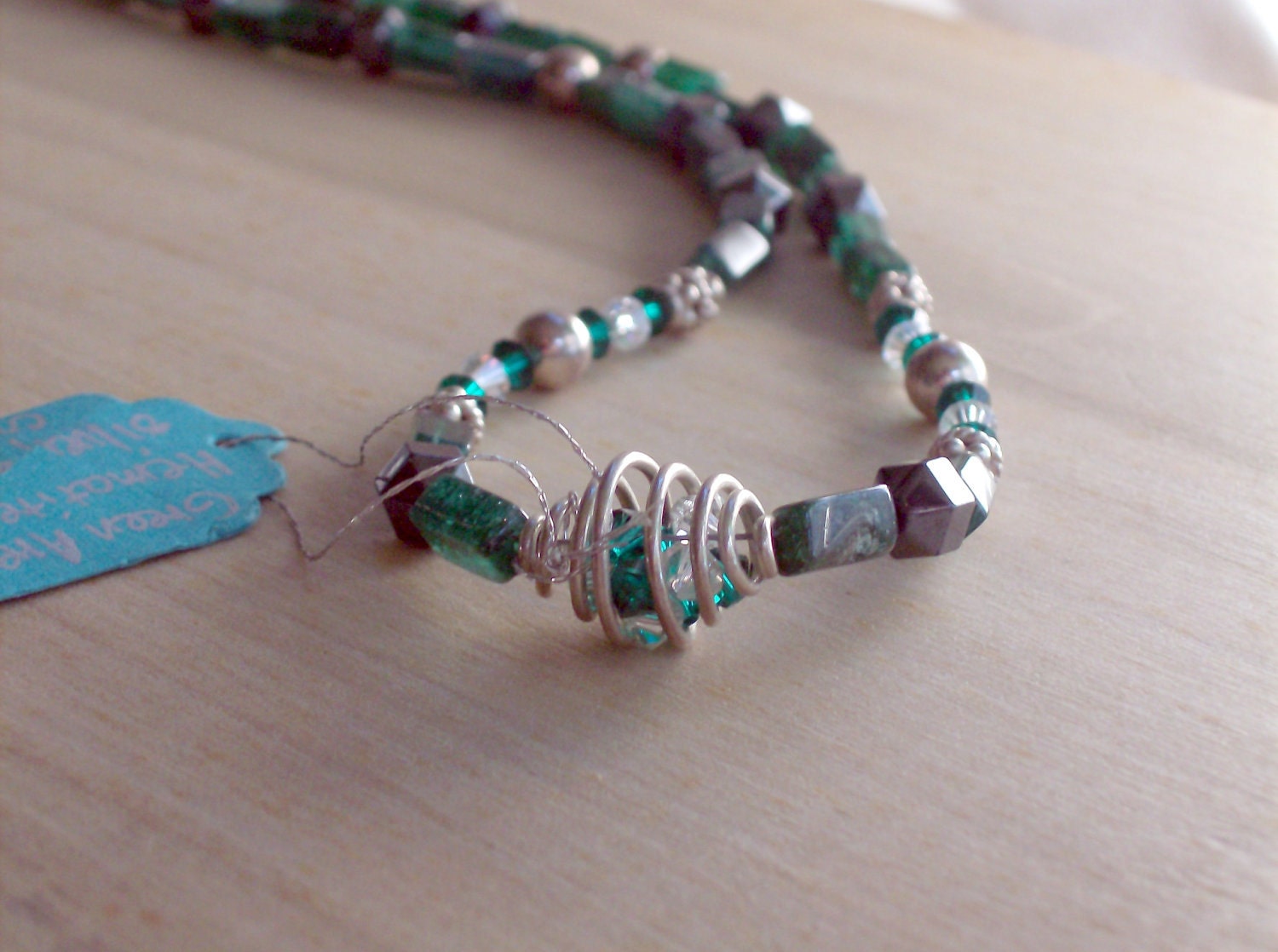 Cage necklace--hematite and green aventurine necklace with Swarovski crystals in a cage