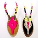 TWO'S COMPANY PAIR of neon bright enamelled painted antique deer skulls and antlers