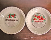 vintage pair of ceramic pie recipe plates: apple and strawberry pie
