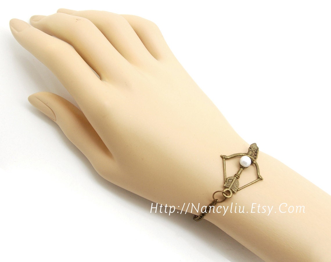 On Sale--The Hunger Games Inspired Katniss Bow With Plastic Peeta Pearl Bracelet in Antique Bronze -- 39B133