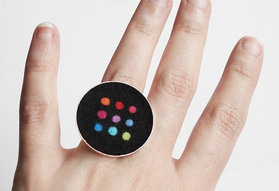 Black felt ring combined with dots in different colors in an adjustable silver tone ring base.