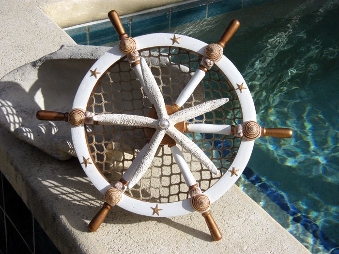 Gold Leaf, Wooden Ships Wheel with Starfish, Seashells, Nettings, Pearl and Crystals. For Holidays or Year Round Home Decor.
