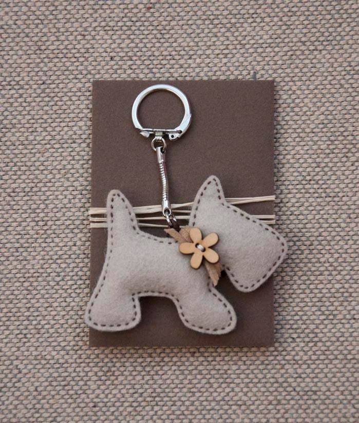 Little puppy with a wooden flower button - key chain pendant