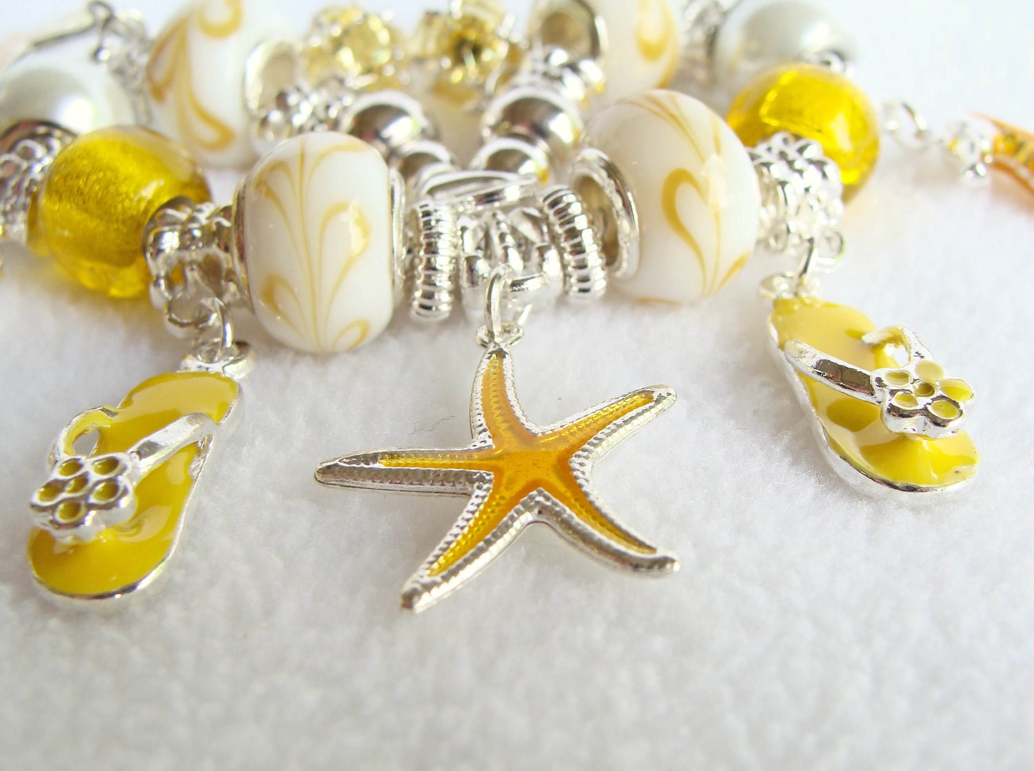 Yellow and White Swirl European Beaded Charm Bracelet with Ocean Charms - GirlieGals