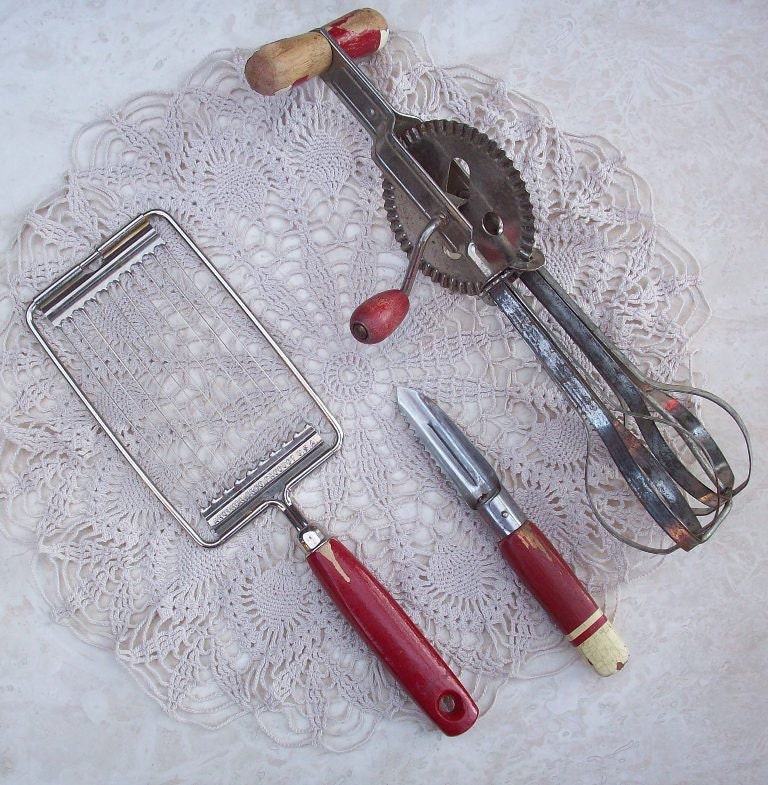Vintage Kitchen Utensils Including Tomato Slicer, Vegetable Peeler and Hand Mixer Red Chippey Wooden Handles