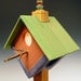 Birdhouse lamp. Night light. Rustic. Folk art. Green, yellow, purple and red. Natural log base. Paper lace windows. 135