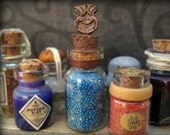Mermaid Tears in a miniature glass bottle with bronze accents, OOAK