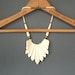 Tribal Bone Bib Necklace . Tailfeathers . Carved .
