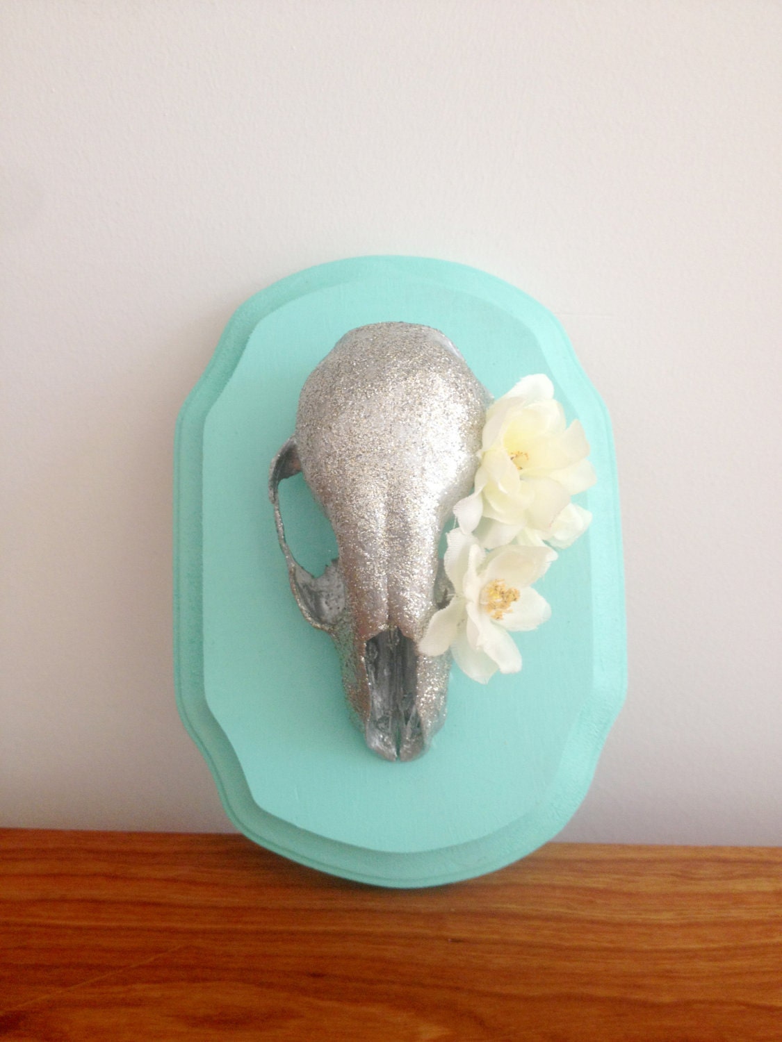 Glitter skull with cream wall mount. 3D art, skull with flowers in it's eye.