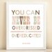 Pink and Brown "Oscar Wilde- Overdressed or Overeducated" print poster