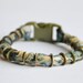 SALE. Fabric and metal cuff. Pastel fabric with vintage nuts and bolts and snap buckle closure. Small size. 25% OFF.