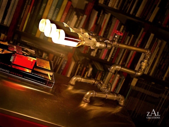 Desk lamp. Beer bottles,  Plumbing pipe & fittings. Table lamp.
