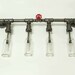 Vanity Lamp. Beer bottles, Plumbing pipe & fittings. Wall light. Bathroom Vanity Lighting Fixture