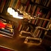 Desk lamp. Beer bottles,  Plumbing pipe & fittings. Table lamp.