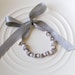 Pearl and ribbon tie bracelet