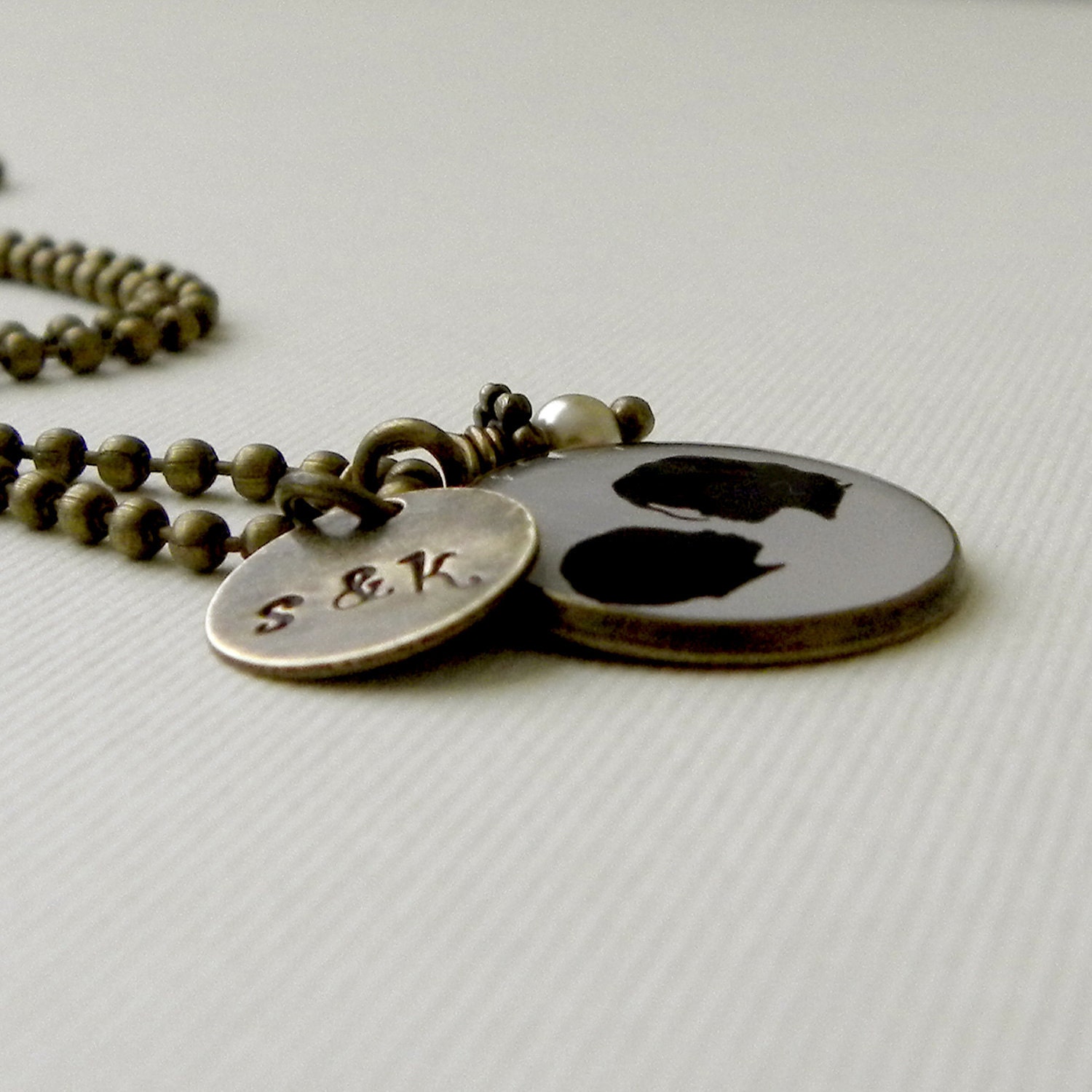 Personalized Two silhouette Necklace in Brass with Stamped Initial charm & Pearl Dangle